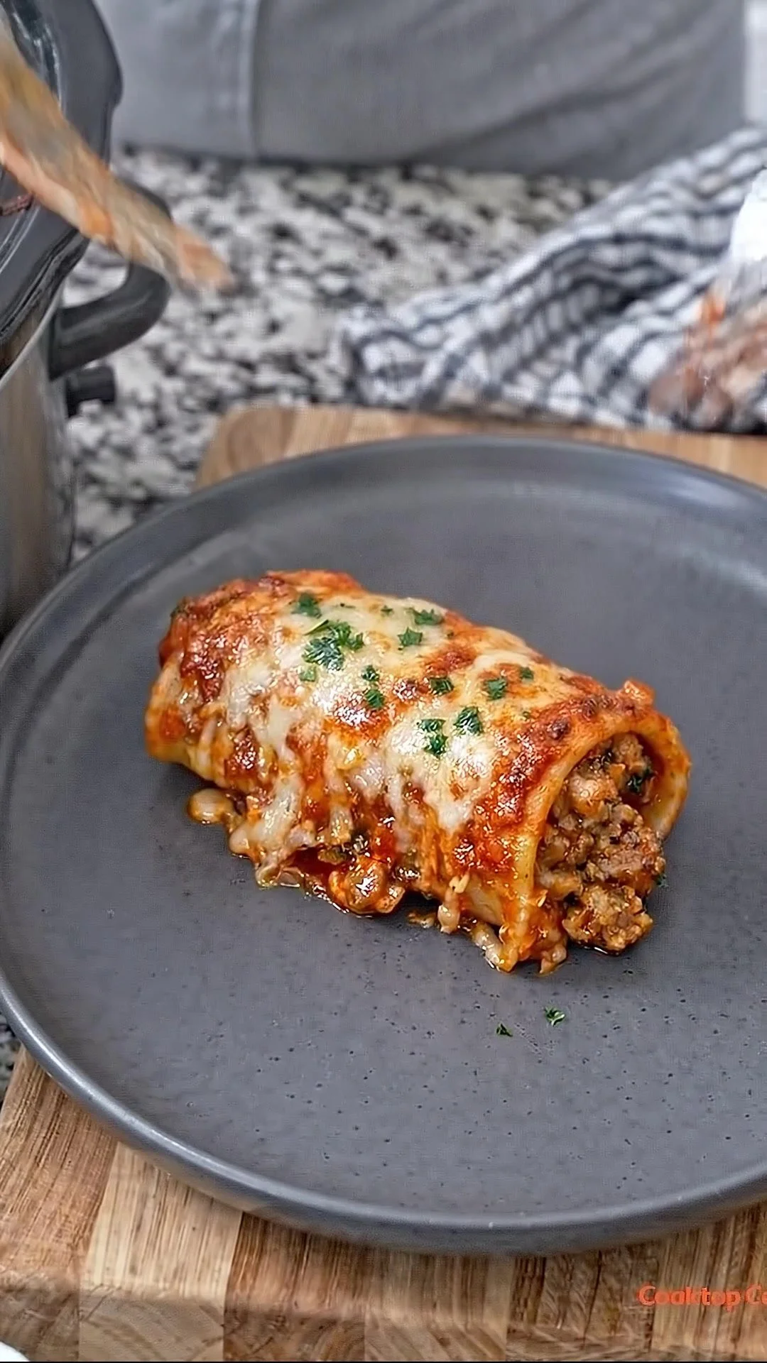 Slow cooker stuffed shells filled with cheese and sauce in a cozy dish