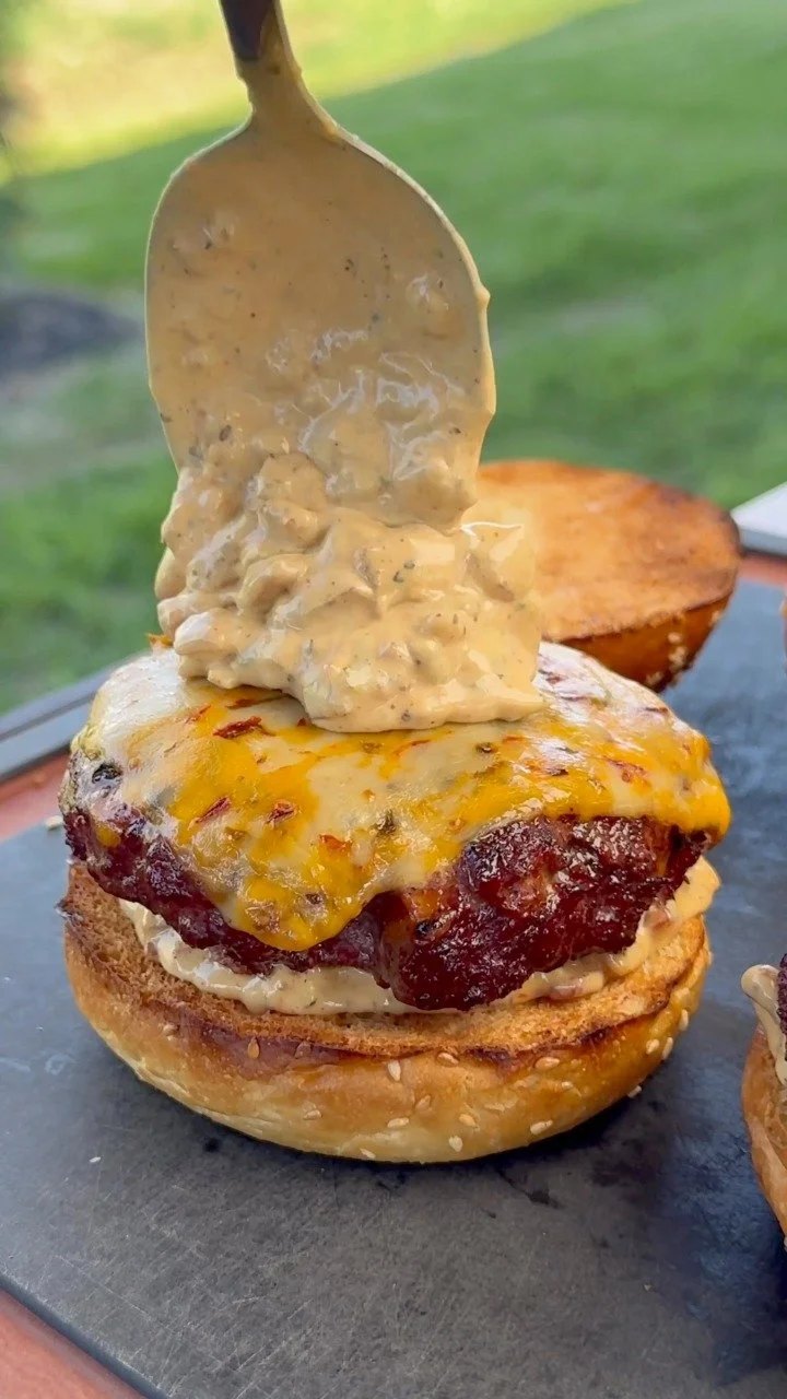 Juicy smoked cheddar burgers with melted cheese and fresh toppings